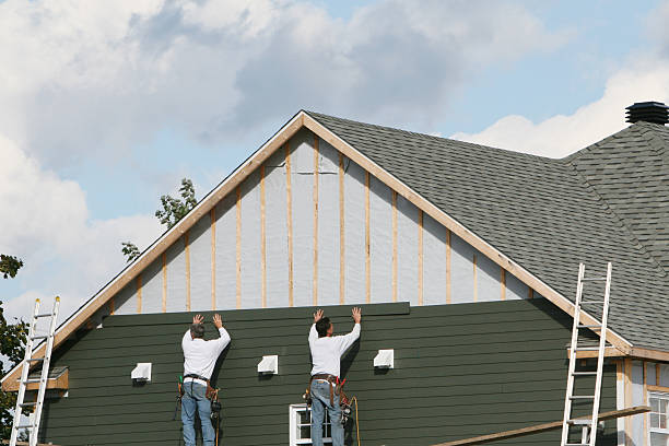 Professional Siding technician working in Sandy Ridge, NC